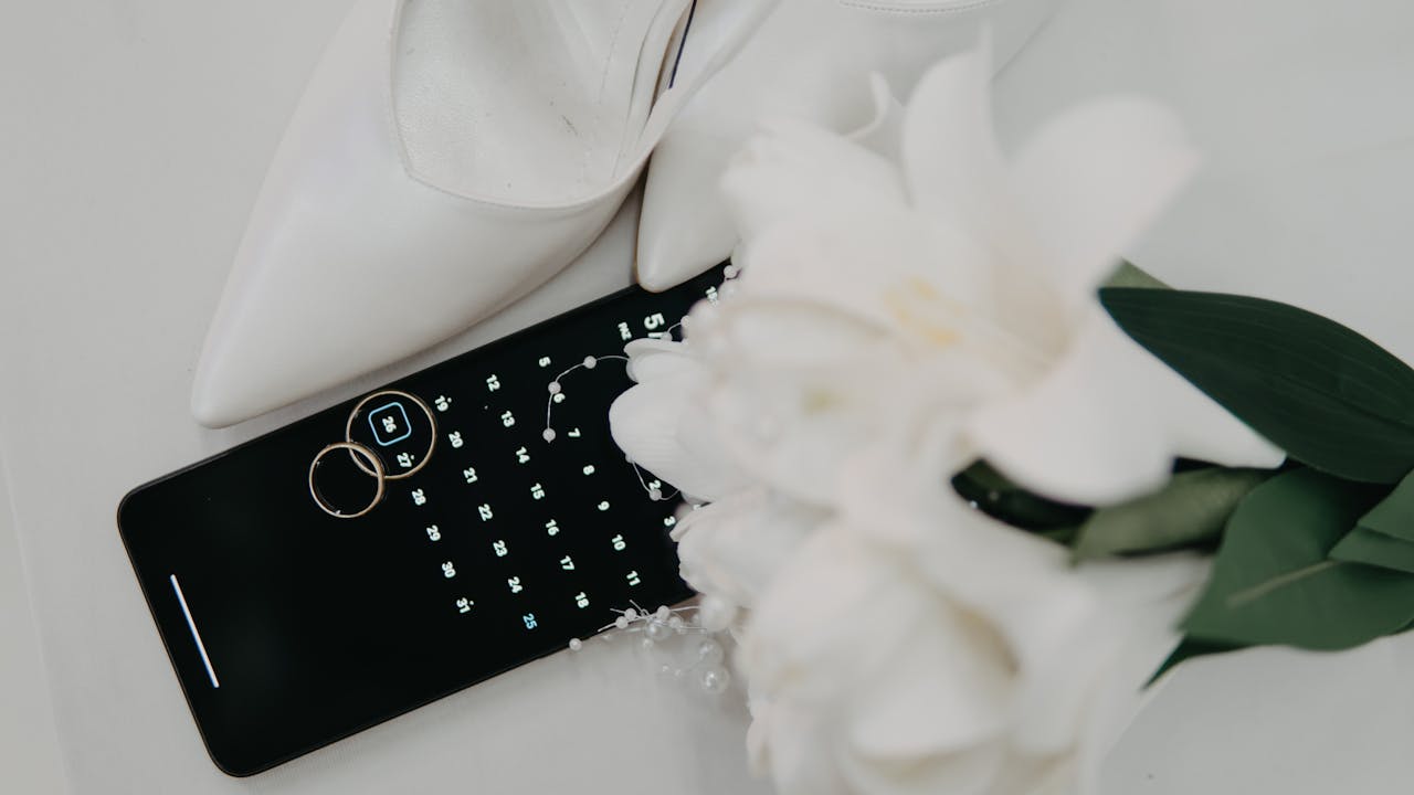 Elegant Wedding Setup with Calendar and Rings